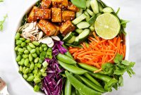 Sesame-Marinated Tofu Salad with Crisp Greens and Ginger Dressing