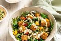 Warm Tempeh and Kale Salad with Lemon-Tahini Dressing