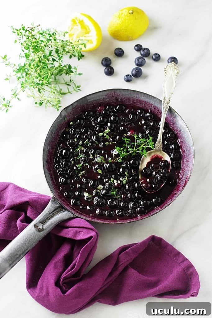 Blueberry sauce in a skillet. 