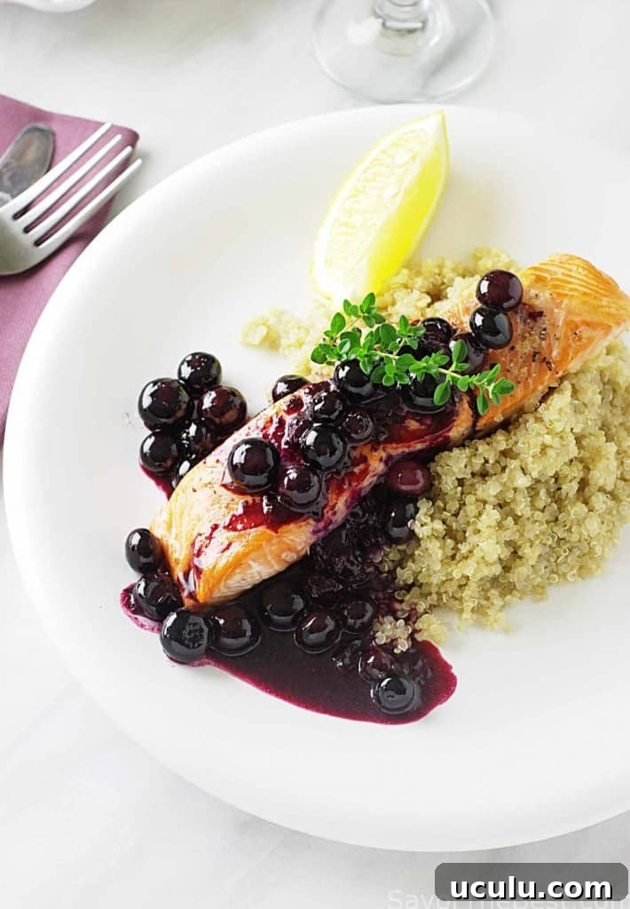 Wild Alaskan King Salmon topped with blueberry sauce. 