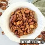 spiced nuts in white bowl