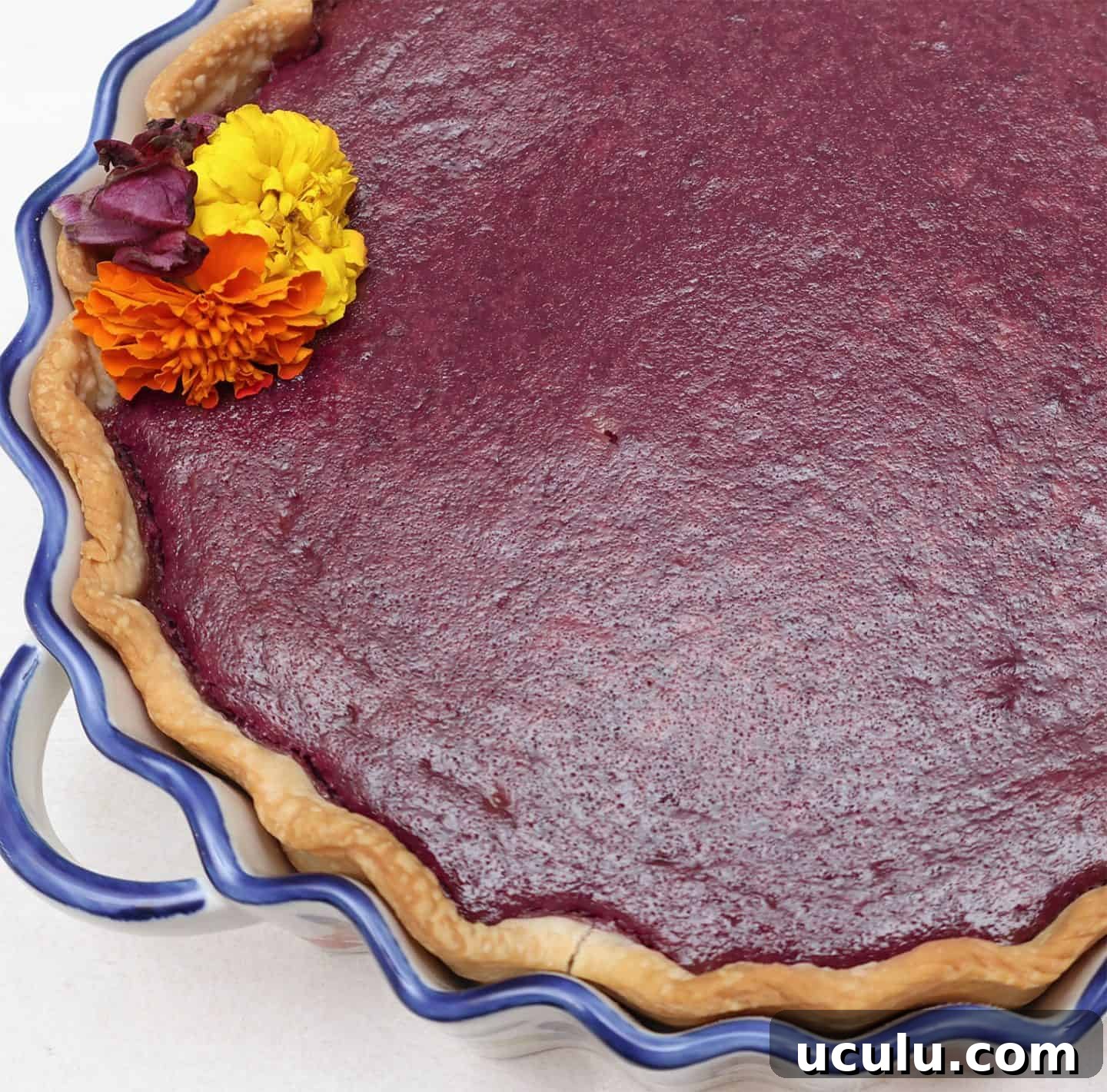 Close-up of Black folks’ purple sweet potato pie filling—smooth, creamy, and richly baked with signature soul food spices and evaporated milk by The Soul Food Pot®