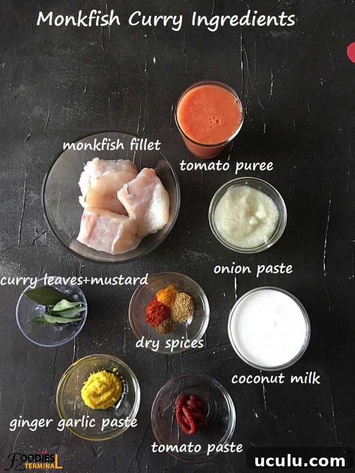 Indian style monkfish curry ingredients in bowls on a black surface