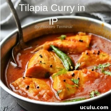 Tilapia fish curry served in an aluminum plate