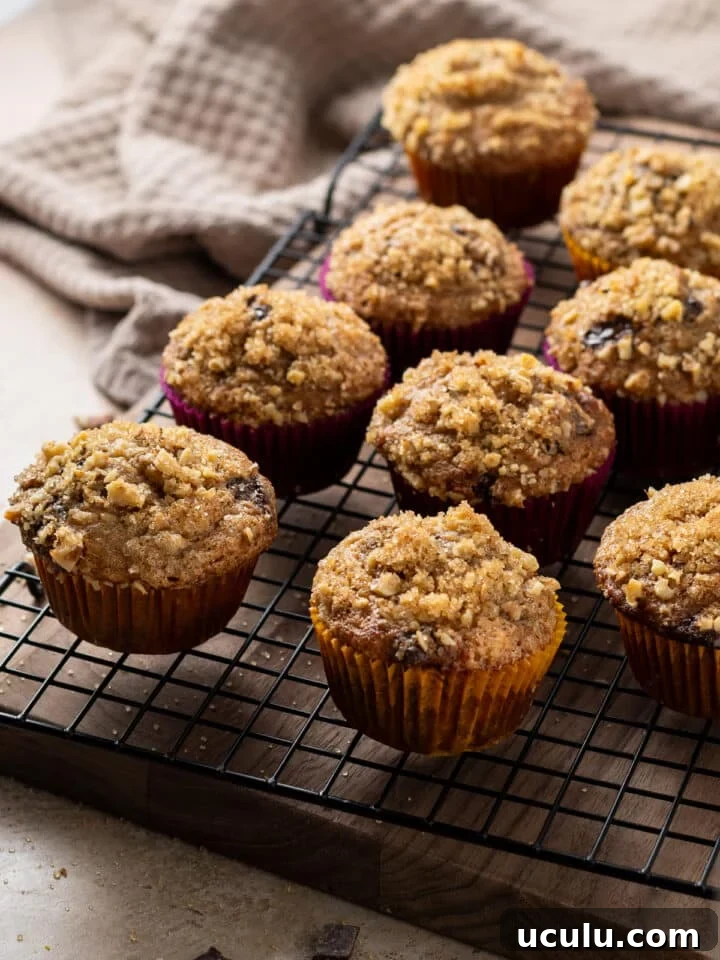 baked sour cream banana muffins on a cooling rack