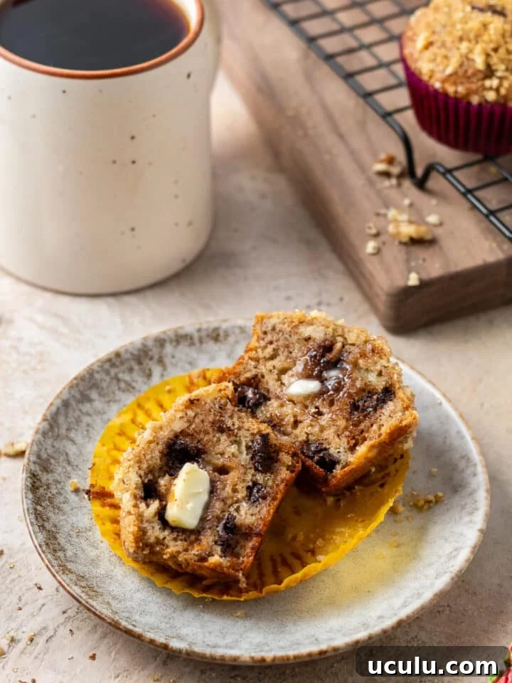 melting butter on the inside of a banana muffin