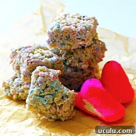 A pile of colorful rice krispie treats made with marshmallow peeps.