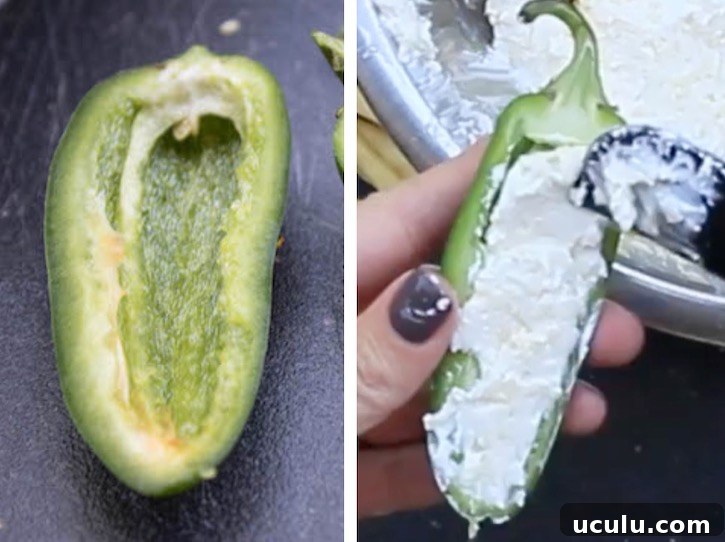 Placing the delicious cream cheese mixture into the Jalapenos. 