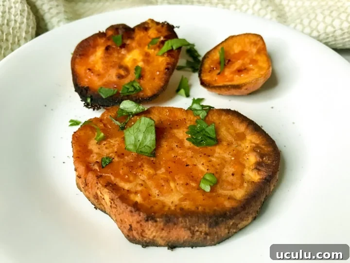 Sweet potato discs with butter, salt, and paprika