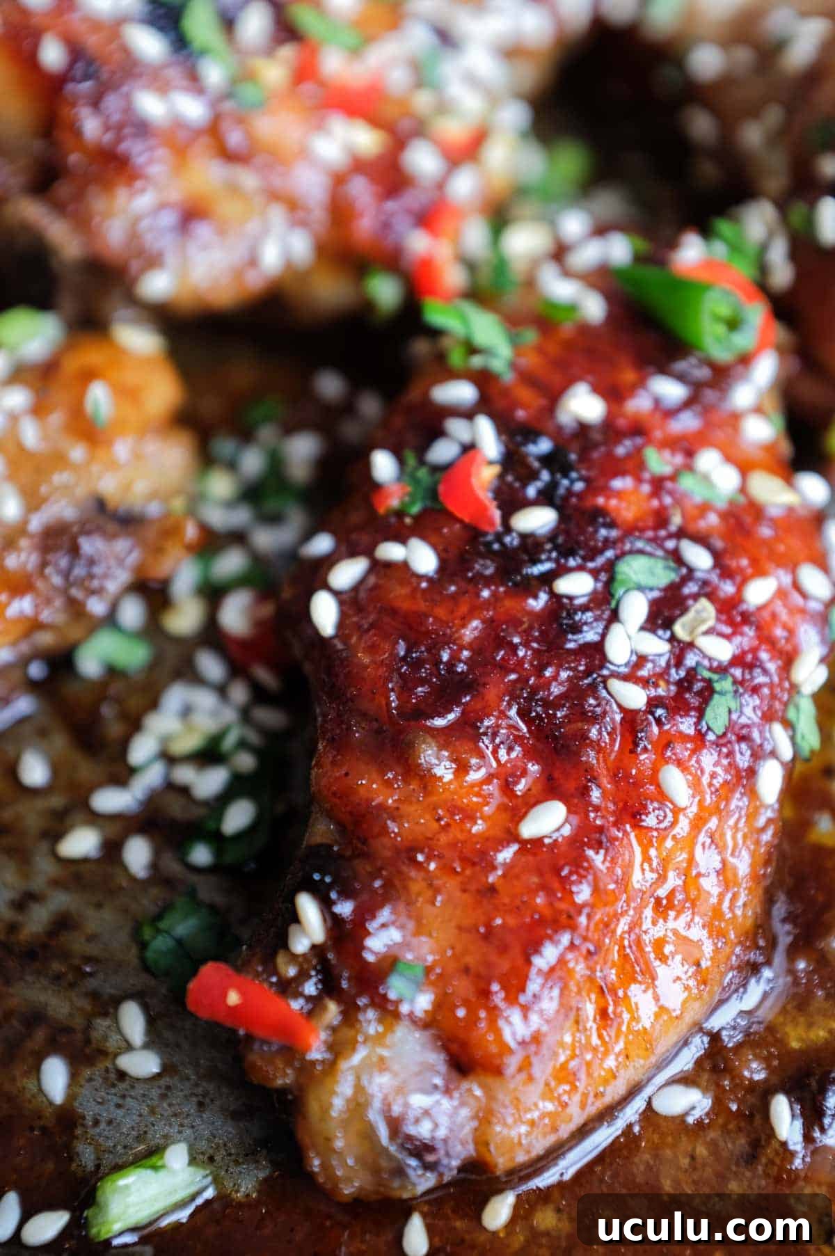 A baking sheet with Sticky Baked Chinese Chicken Wings