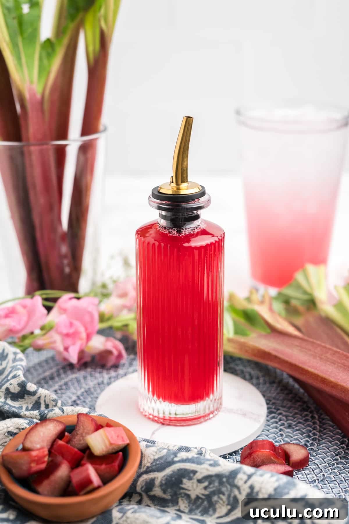 Rhubarb Simple Syrup in a bottle.
