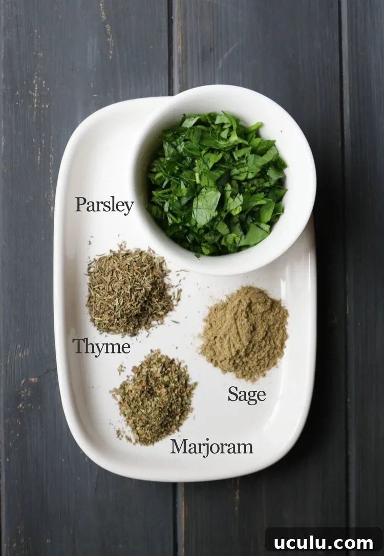white plate with a bowl of freshly chopped parsley and piles of dried thyme, sage and marjoram