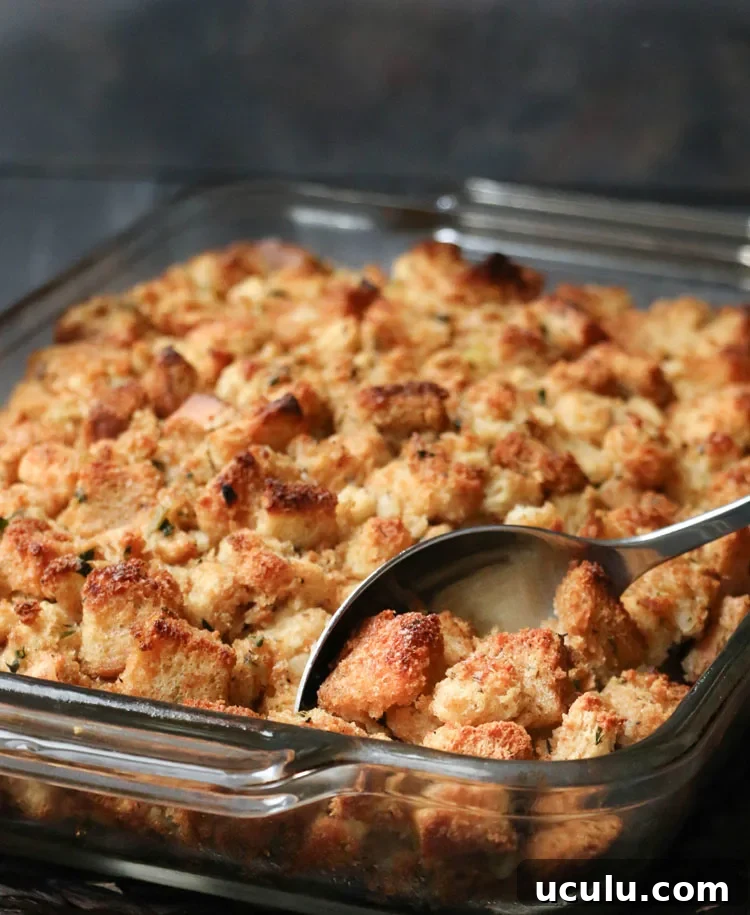 Serving spoon scooping out Classic Herb Stuffing