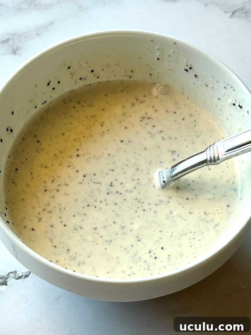 Poppy seed dressing in a small bowl
