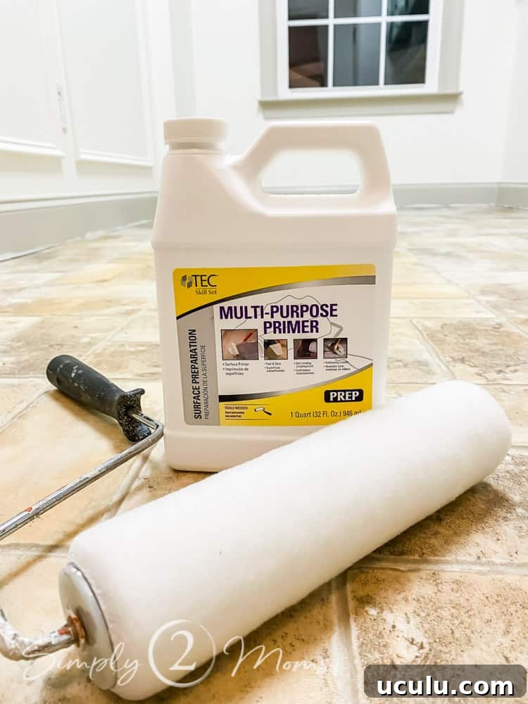 Bottle of Tec Multi-purpose Primer sitting on a linoleum floor with a roller on a roller frame