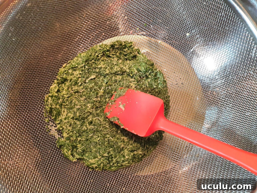 pressing on mint to squeeze out infused milk