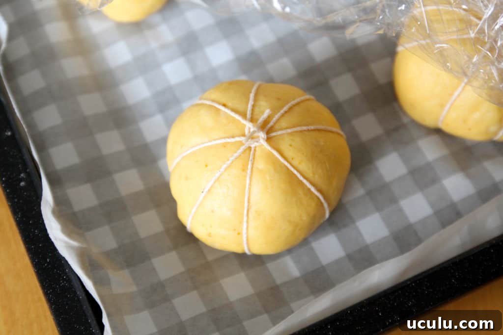 The buns have canned pumpkin in the dough, but the flavor is subtle. Instead they look like cute little pumpkins!