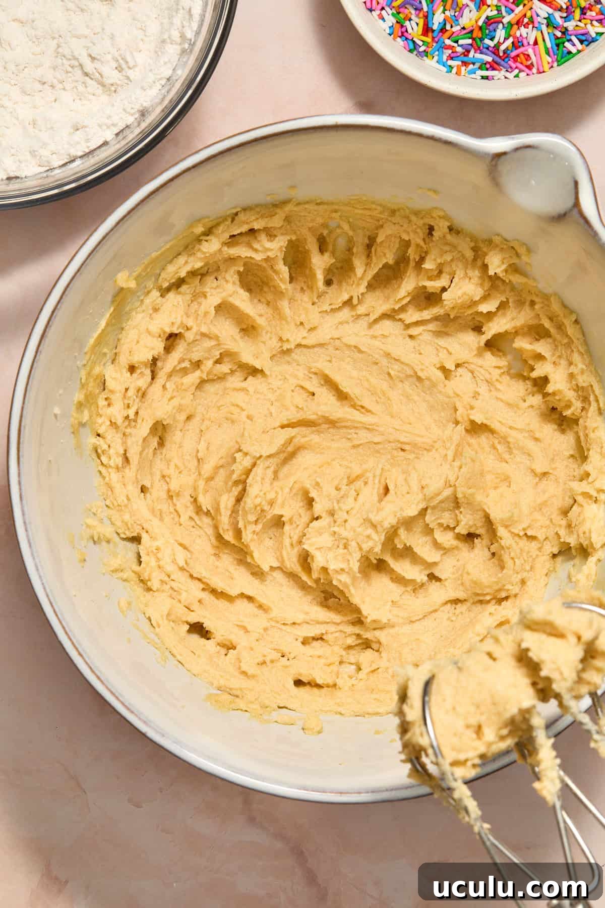 Vanilla and egg added and mixed into creamed butter and sugar.