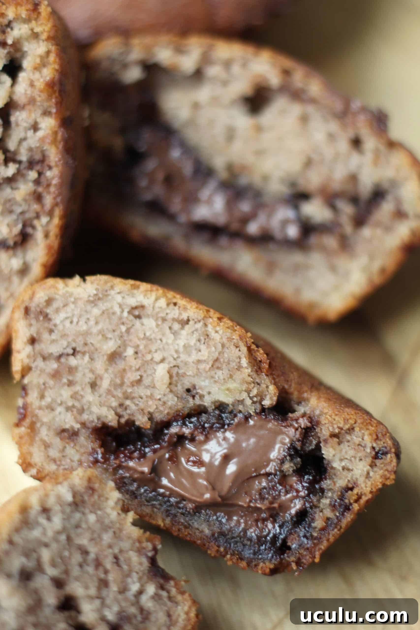 A gluten free banana muffin stuffed with Nutella in the centre.