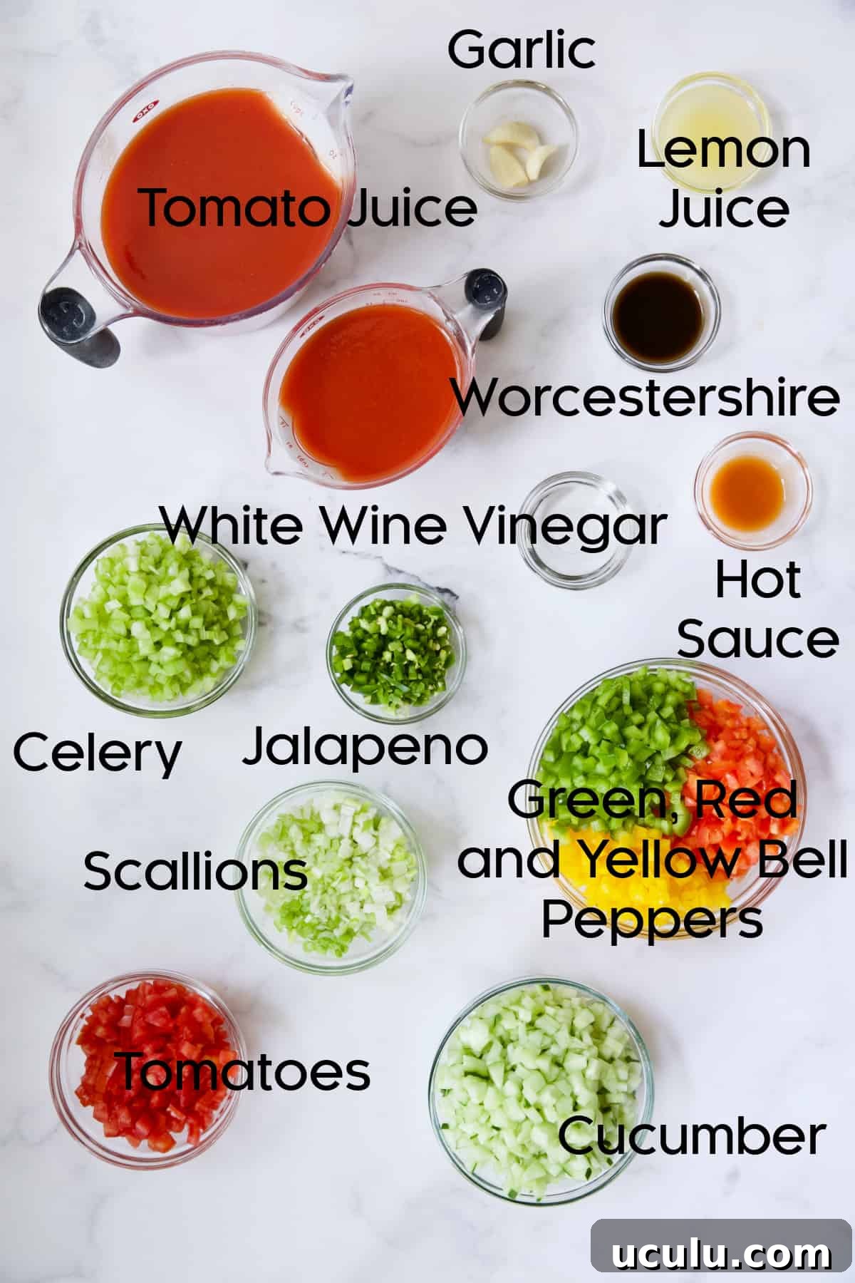 Ingredients for Very Veggie Gazpacho in glass bowls.
