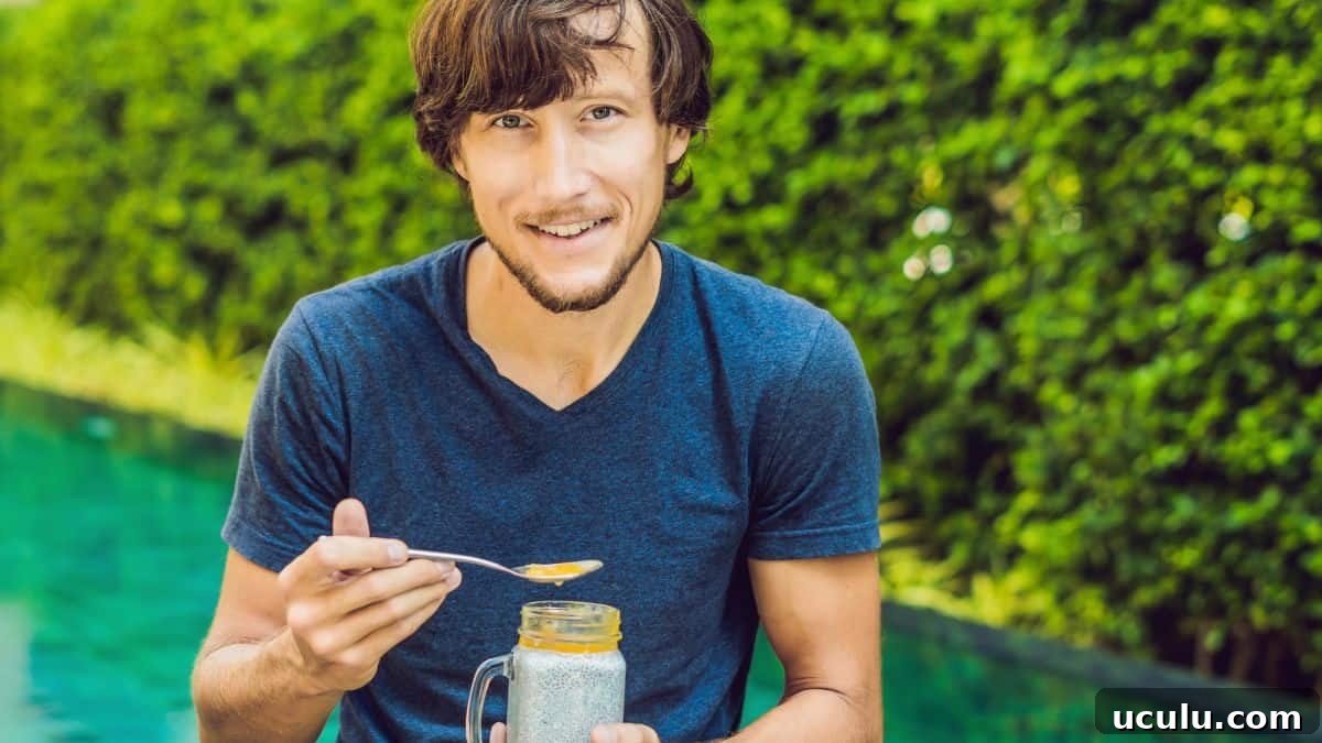 man eating chia pudding