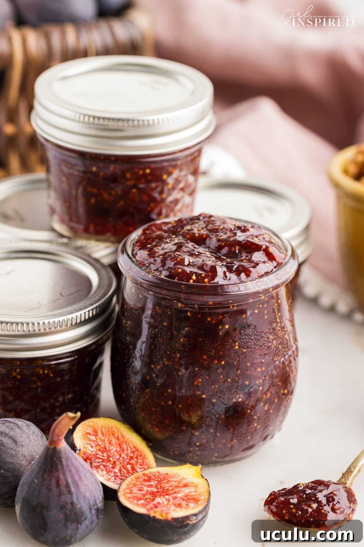 Balsamic fig jam transferred into glass mason jars.