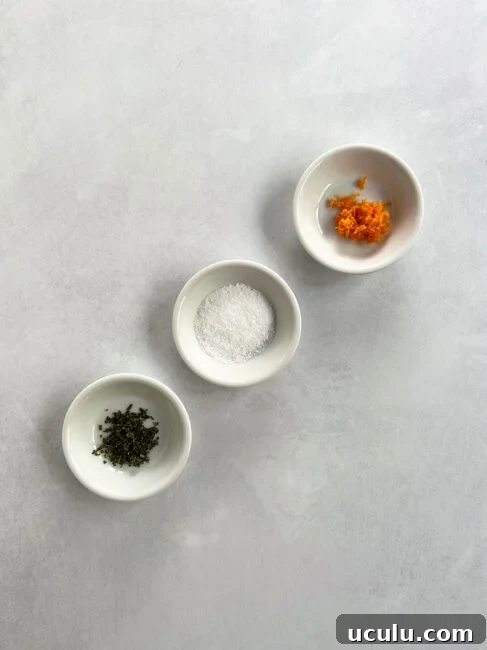 Three ingredients for the dry brine in 3 separate small white bowls.