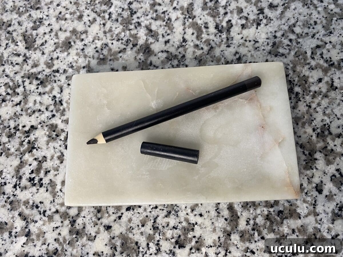 a picture of a natural black eyeliner of Toups and Co.