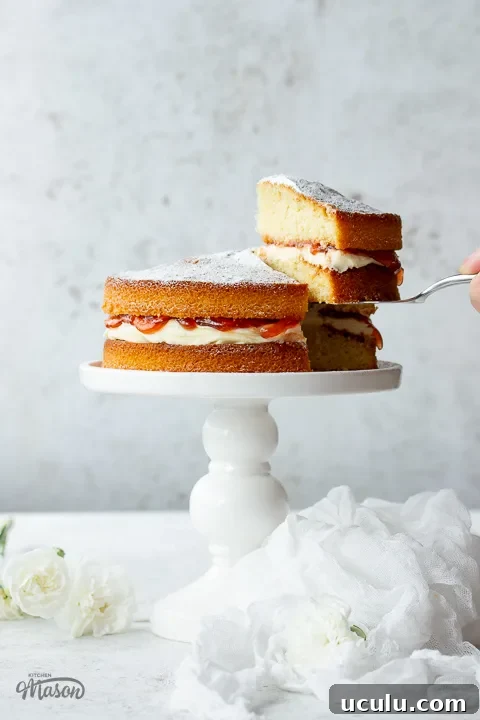 Someone slicing an air fryer cake