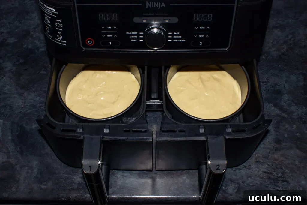 Filled cake tins in an air fryer