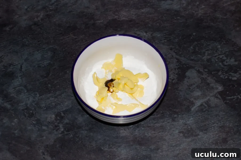 Butter, icing sugar and vanilla in a small bowl