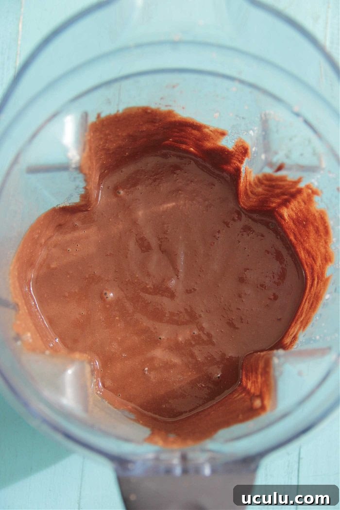 Chocolate Protein Blender Muffin batter in a blender