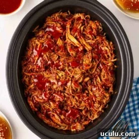 Pulled pork in a slow cooker.