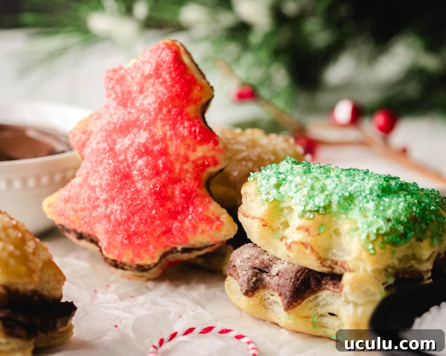 Puff pastry christmas tree with nutella and topped with red or green sanding sugar.