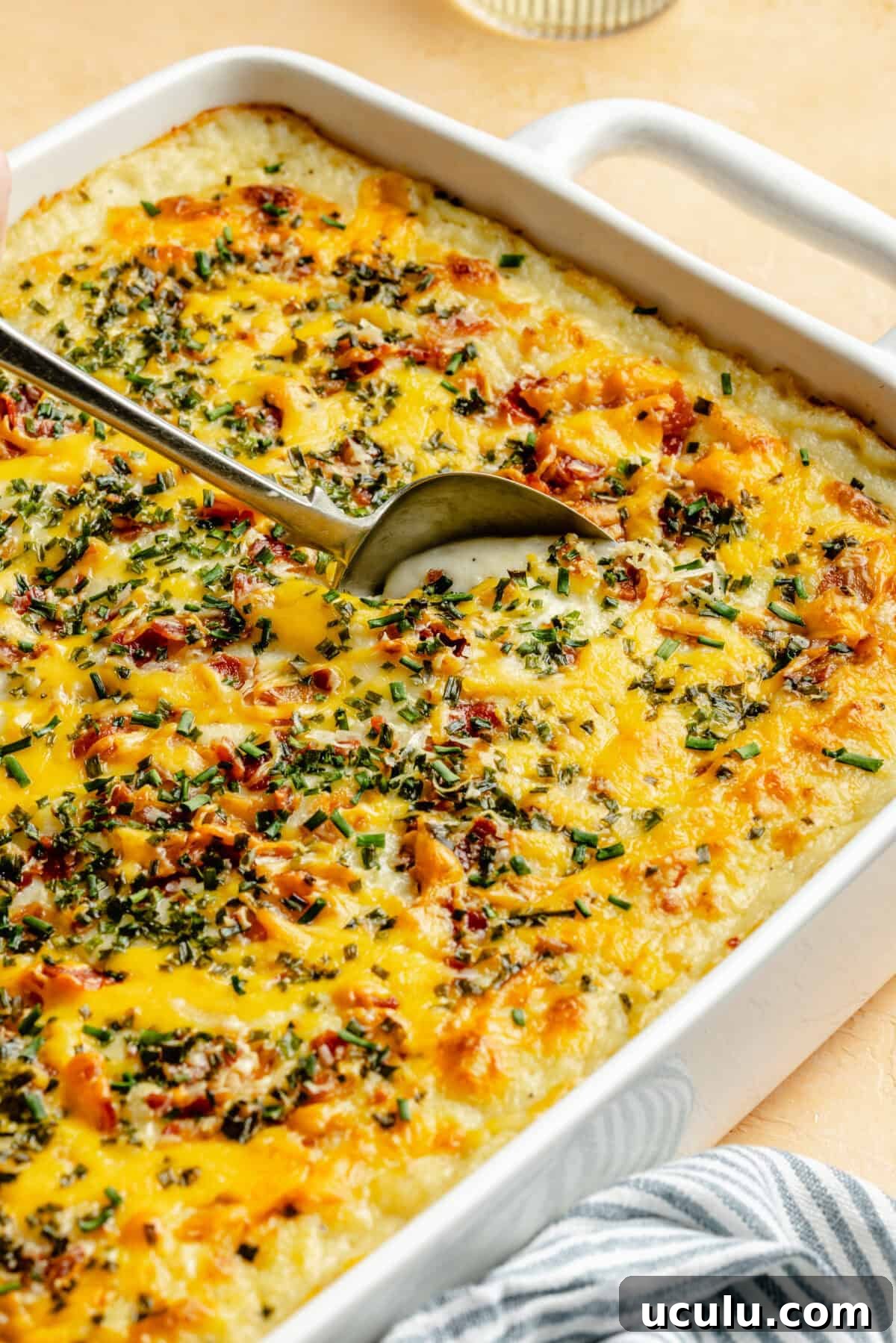 GoGo’s Party Potatoes in white baking dish.