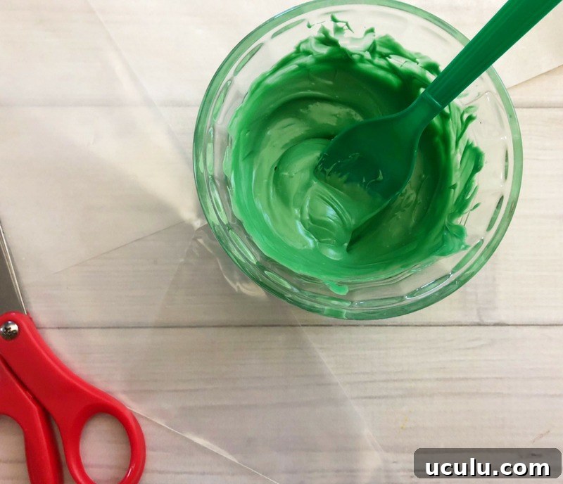 Melted green candy melts for Indian Corn Harvest Cookies idea.