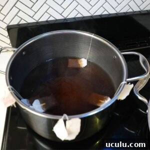 Black tea steeping in a pot.