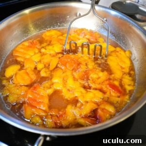 Peaches mashed in syrup.
