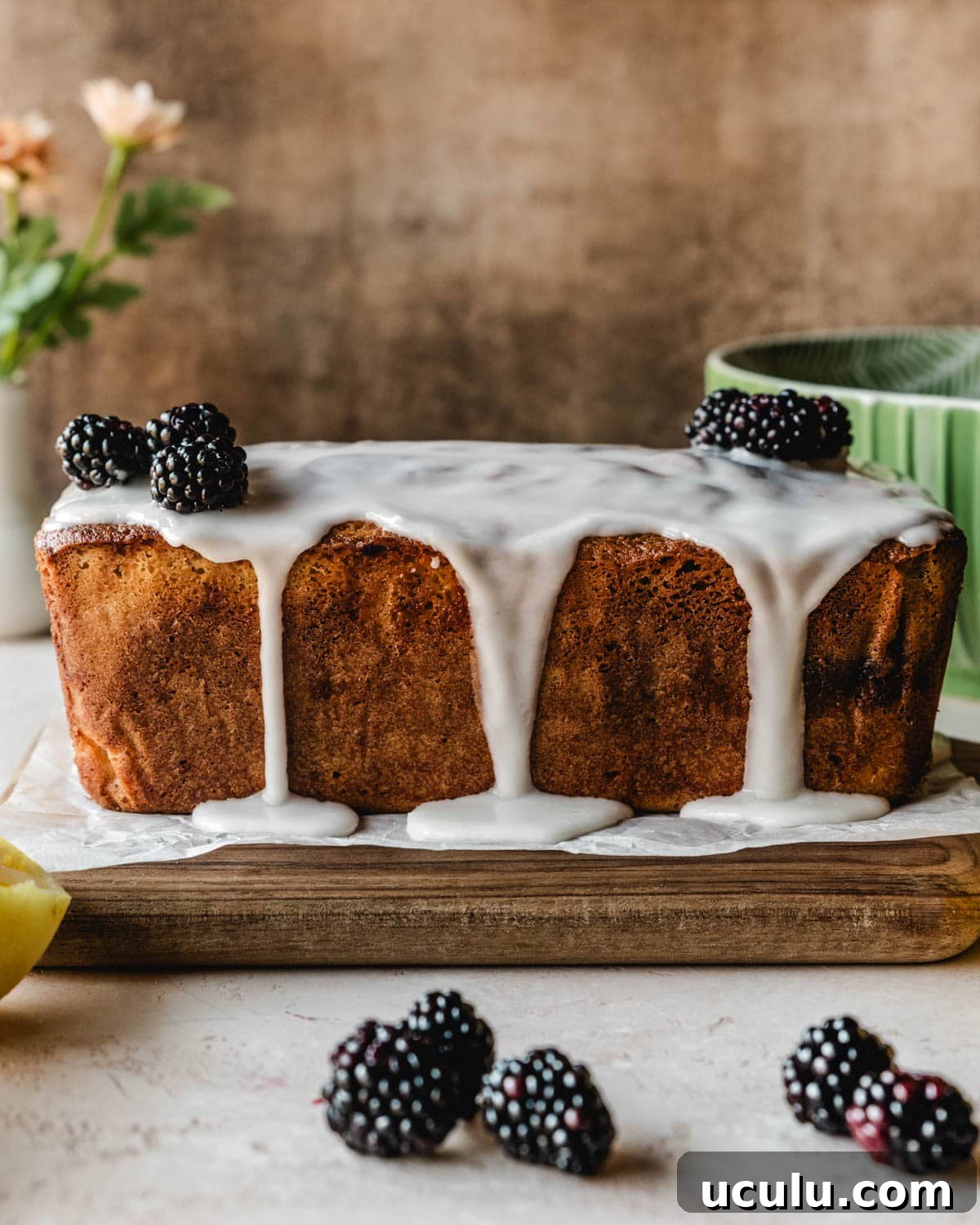 Blackberry lemon loaf with lemon glaze.