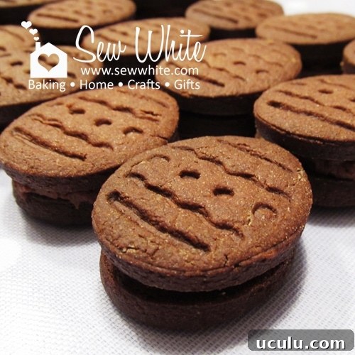 Chocolate Bourbon Biscuits stacked up with a chocolate filling.