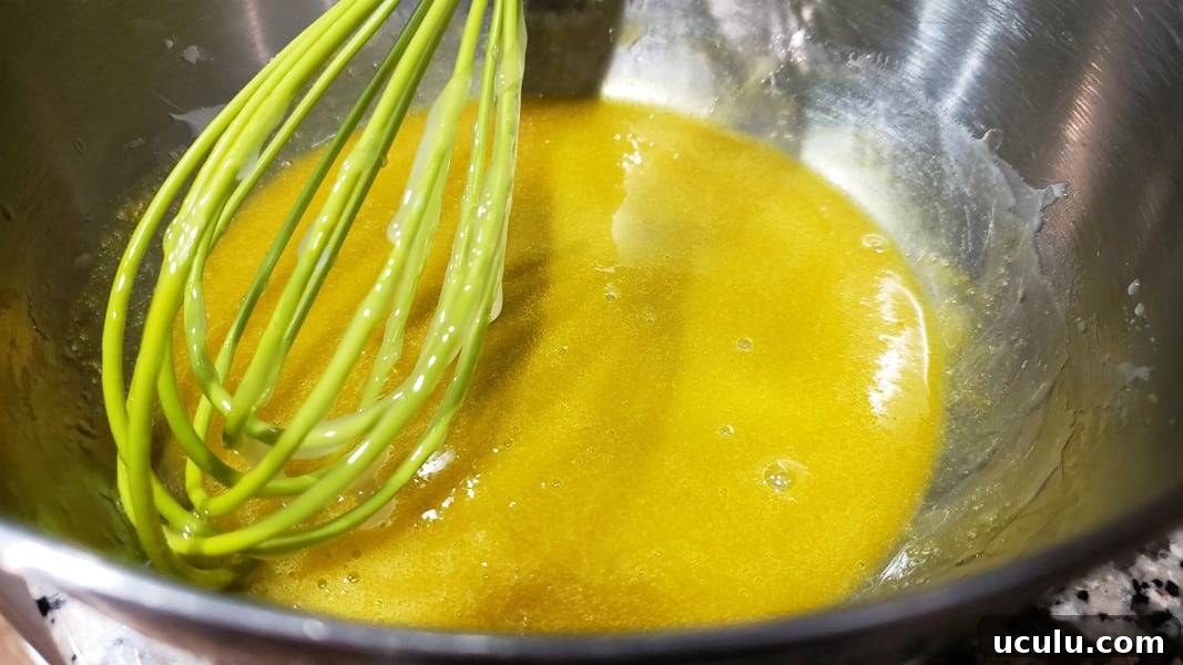 egg yolk with cornstarch mixture tempered in.