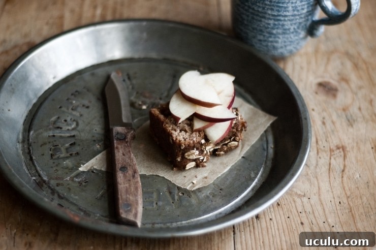 Apple Loaf Cake with apple slices and cup of coffee