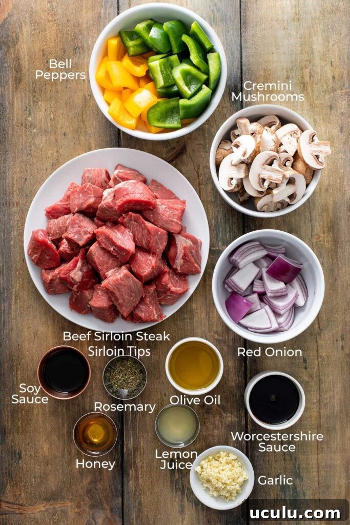 Ingredients to make beef kabobs with vegetables.