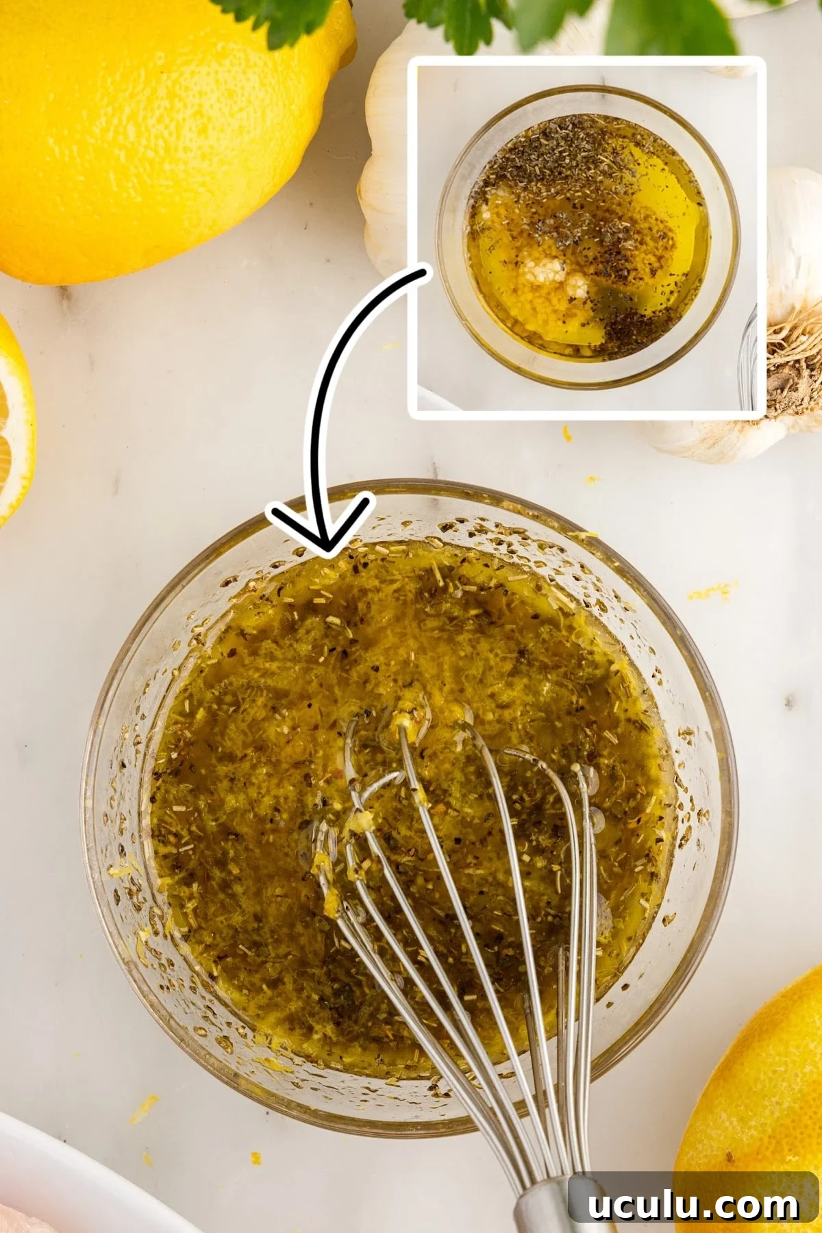 Olive oil, Italian seasoning, salt, pepper, lemon juice, garlic, lemon zest, and Dijon mustard in a mixing bowl.