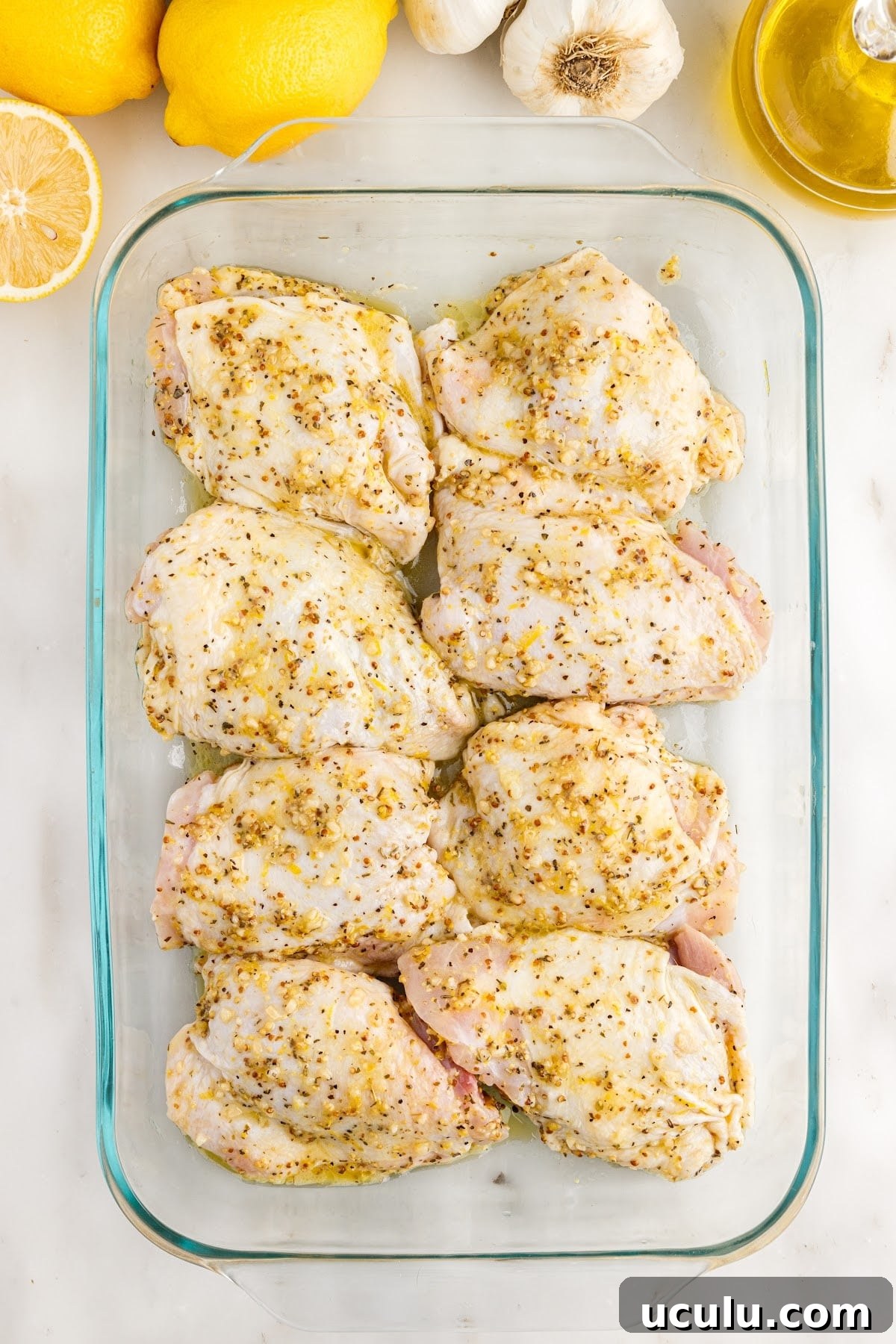 Baked Chicken Thighs in a 9x13 before baking.