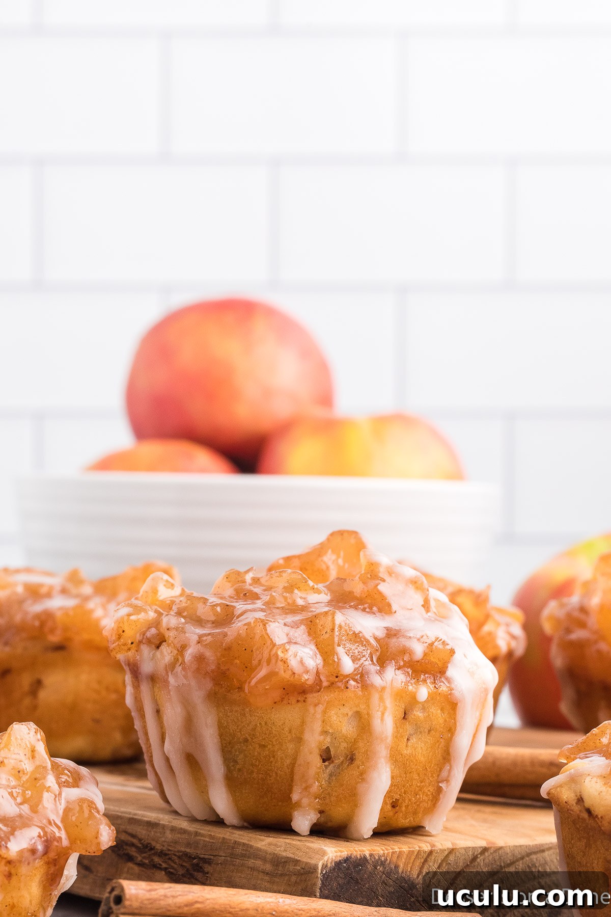 Cinnamon Roll Apple Pie Cups on a cutting board