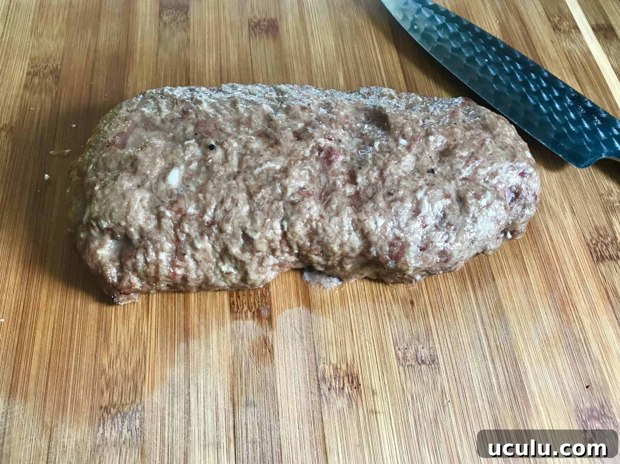 Gyro Meat cooked on cutting board reading to be sliced