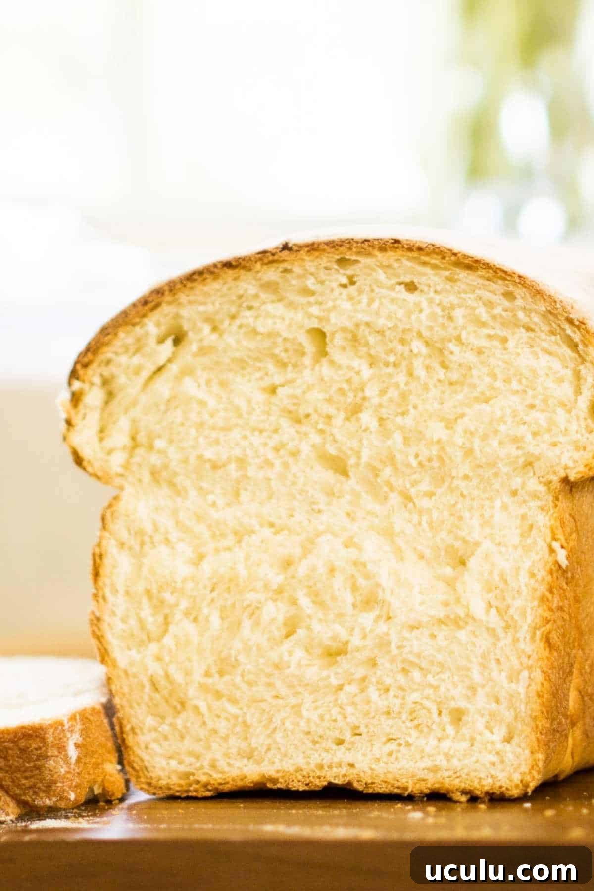 cut sandwich loaf on cutting board
