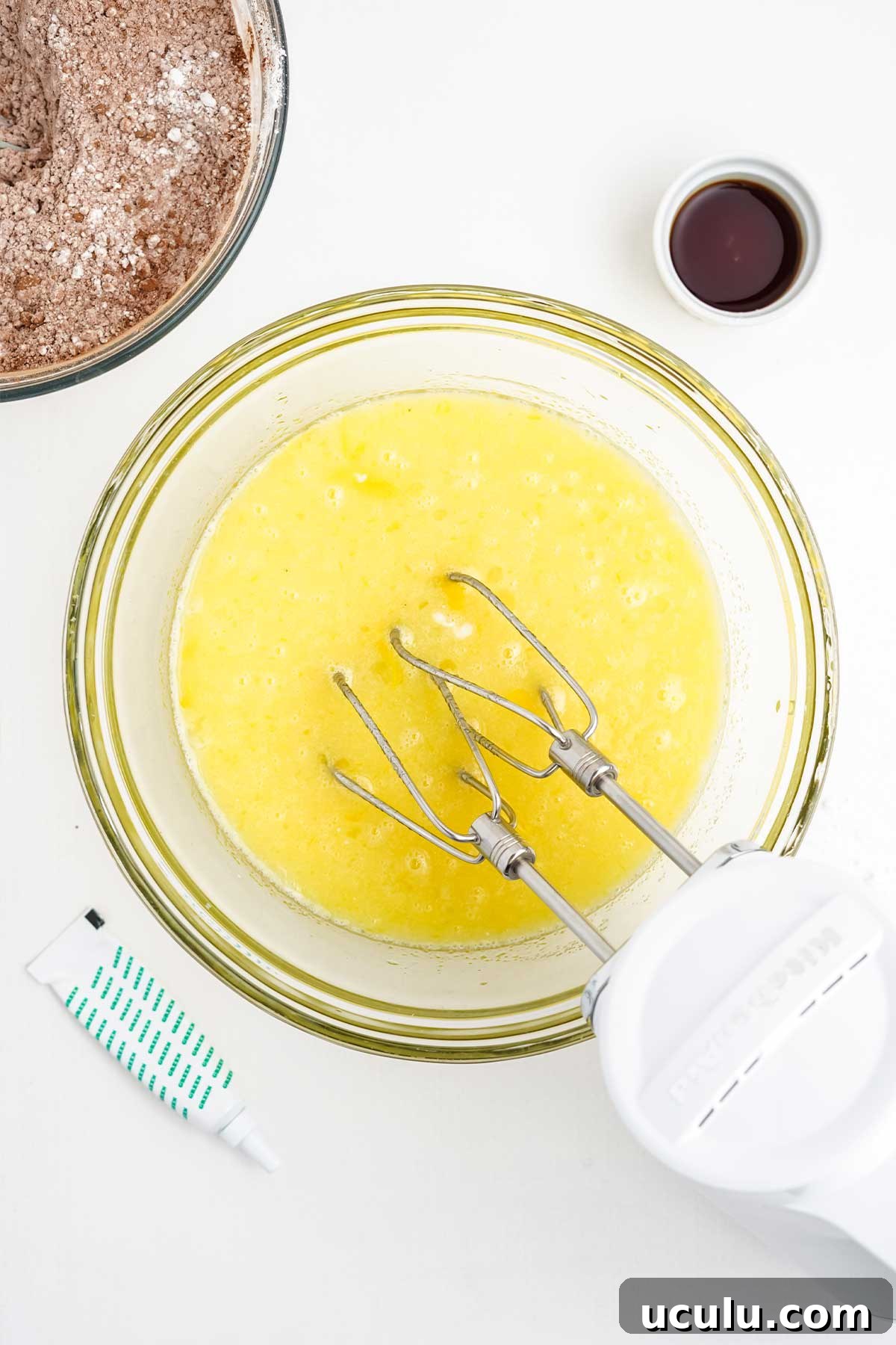 Mixing the wet ingredients for the cupcakes.