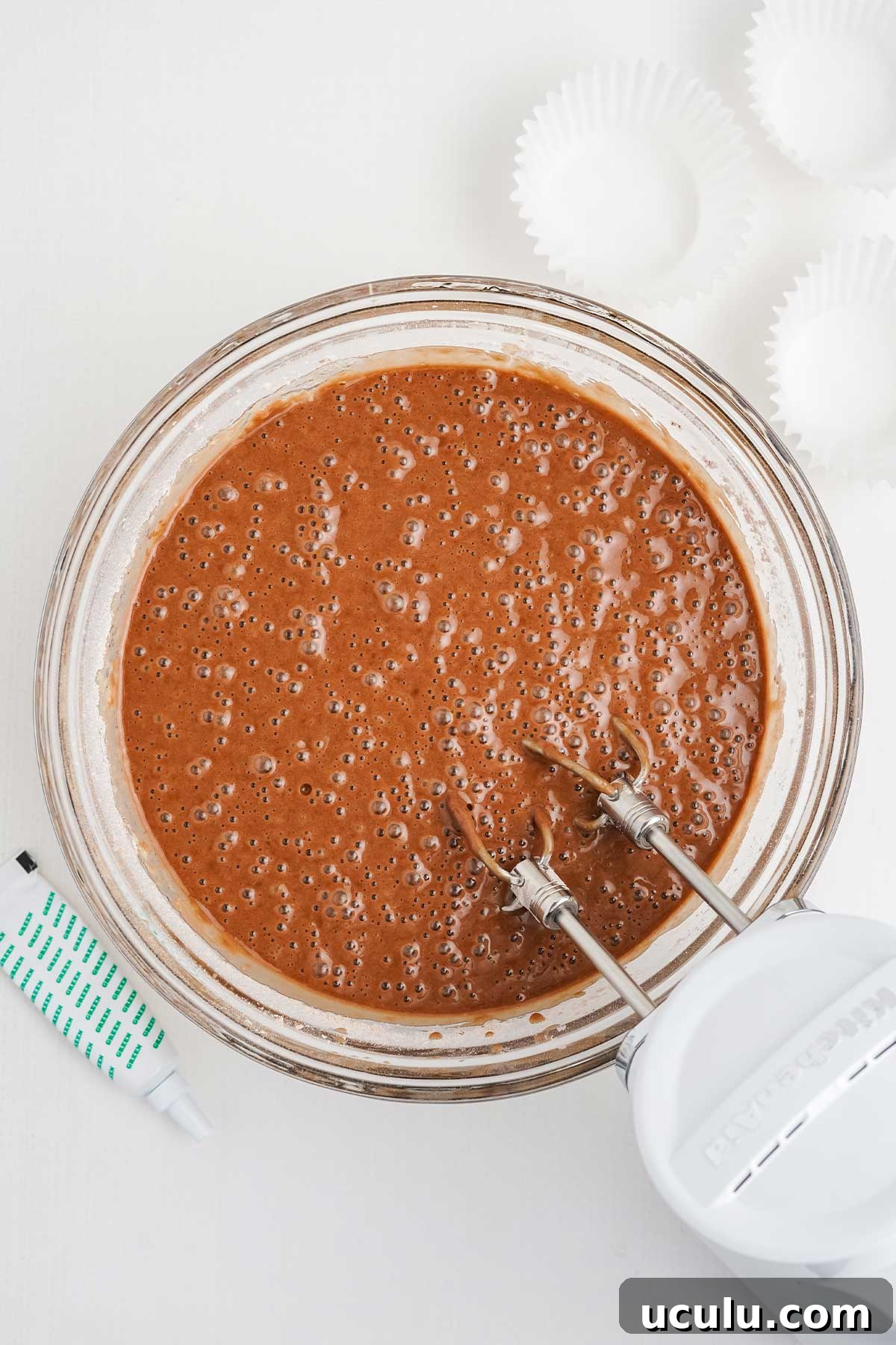 Chocolate cake batter mixed in a bowl.